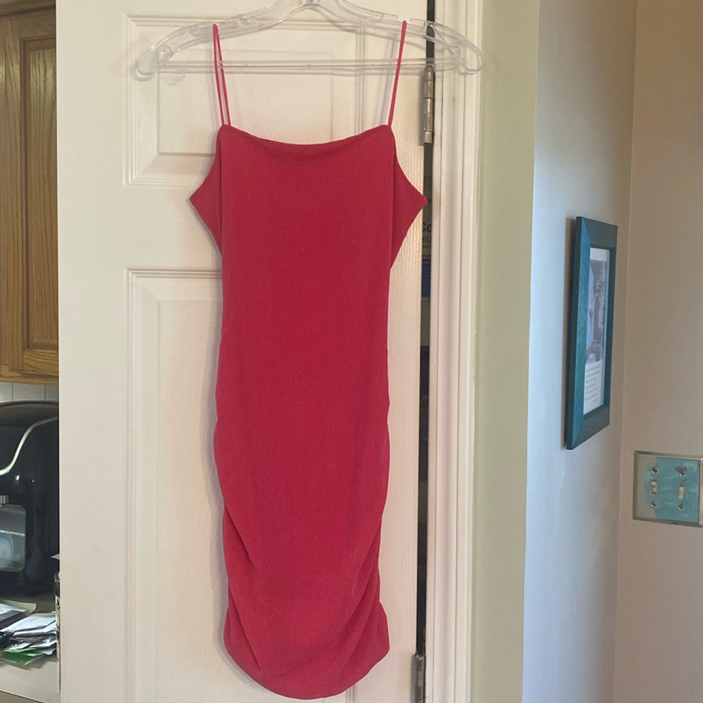 Pink shimmering dress size small, with opening back accent